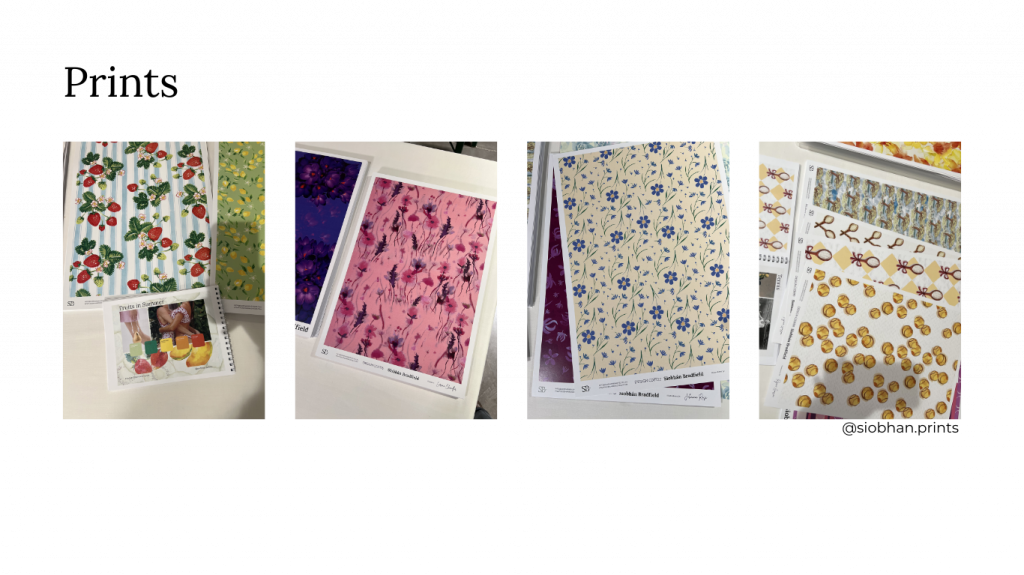 A set of four colorful floral pattern sheets on paper for fashion textiles: strawberries on white, pink flowers, blue flowers on yellow, and scattered yellow coins with script.